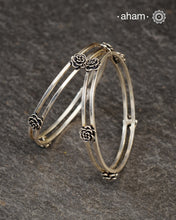 Handcrafted 92.5 sterling silver bangles with roses.
