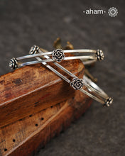 Handcrafted 92.5 sterling silver bangles with roses.