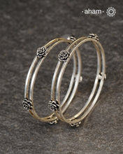 Handcrafted 92.5 sterling silver bangles with roses.