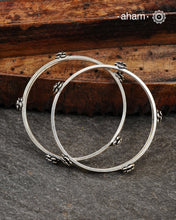 Handcrafted 92.5 sterling silver bangles with roses.