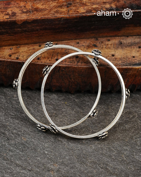 Handcrafted 92.5 sterling silver bangles with roses.
