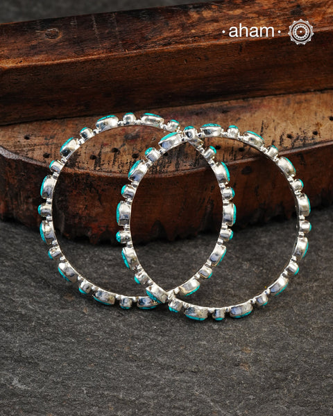Handcrafted Summer Love bangles in 92.5 sterling silver with turquoise coloured stone highlights. Perfect everyday wear you can stack them or wear them alone.