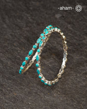 Handcrafted Summer Love bangles in 92.5 sterling silver with turquoise coloured stone highlights. Perfect everyday wear you can stack them or wear them alone.