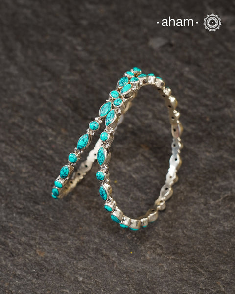 Handcrafted Summer Love bangles in 92.5 sterling silver with turquoise coloured stone highlights. Perfect everyday wear you can stack them or wear them alone.