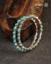Handcrafted Summer Love bangles in 92.5 sterling silver with turquoise coloured stone highlights. Perfect everyday wear you can stack them or wear them alone.