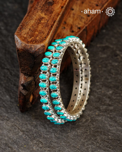 Handcrafted Summer Love bangles in 92.5 sterling silver with turquoise coloured stone highlights. Perfect everyday wear that you can stack them or wear them alone.
