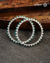 Handcrafted Summer Love bangles in 92.5 sterling silver with turquoise coloured stone highlights. Perfect everyday wear that you can stack them or wear them alone.