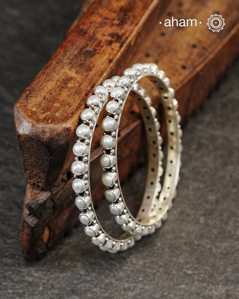 Handcrafted Summer Love bangles in 92.5 sterling silver with Pearls.