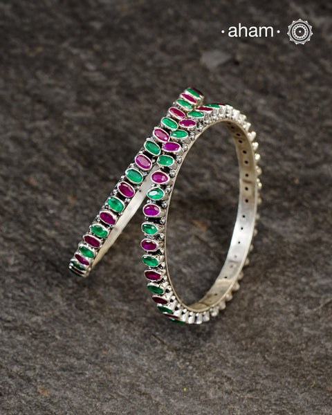 Handcrafted Summer Love bangles in 92.5 sterling silver with green and maroon coloured stone highlights. They look great with Indian clothes.