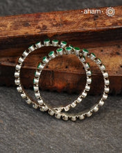 Handcrafted Summer Love bangles in 92.5 sterling silver with green coloured stones; Perfect everyday wear, you can stack them or wear them alone.