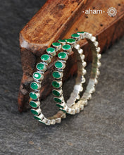 Handcrafted Summer Love bangles in 92.5 sterling silver with green coloured stones. Perfect everyday wear, you can stack them or wear them alone.