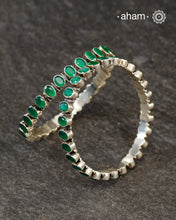 Handcrafted Summer Love bangles in 92.5 sterling silver with green coloured stones.; Perfect everyday wear, you can stack them or wear them alone.