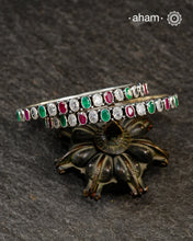 Handcrafted Summer Love bangles in 92.5 sterling silver with green and maroon stone setting. Perfect for everyday wear, you can stack them or wear them alone.
