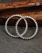 Handcrafted Summer Love bangles in 92.5 sterling silver with green and maroon stone setting. Perfect for everyday wear, you can stack them or wear them alone.