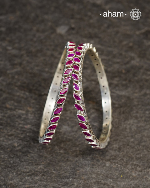 Handcrafted Summer Love bangles in 92.5 sterling silver with maroon coloured stone highlights. Perfect everyday wear that you can stack them or wear them alone.