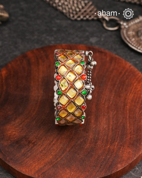 Handcrafted vintage silver kada with yellow glass stones and green and red highlights A beautiful unique piece this is. Price is for one piece only.