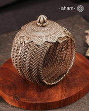 Vintage Rigid Silver armlet with weave work and flower pattern on top. Statement vintage silver kada with intricate floral work, handcrafted by skilful artisans. Beautiful piece from a bygone era, that bring back memories and stories of that time.