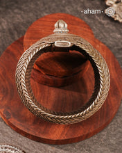 Vintage Rigid Silver armlet with weave work and flower pattern on top. Statement vintage silver kada with intricate floral work, handcrafted by skilful artisans. Beautiful piece from a bygone era, that bring back memories and stories of that time.