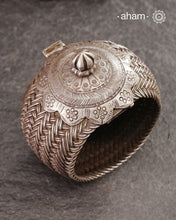 Vintage Rigid Silver armlet with weave work and flower pattern on top. Statement vintage silver kada with intricate floral work, handcrafted by skilful artisans. Beautiful piece from a bygone era, that bring back memories and stories of that time.