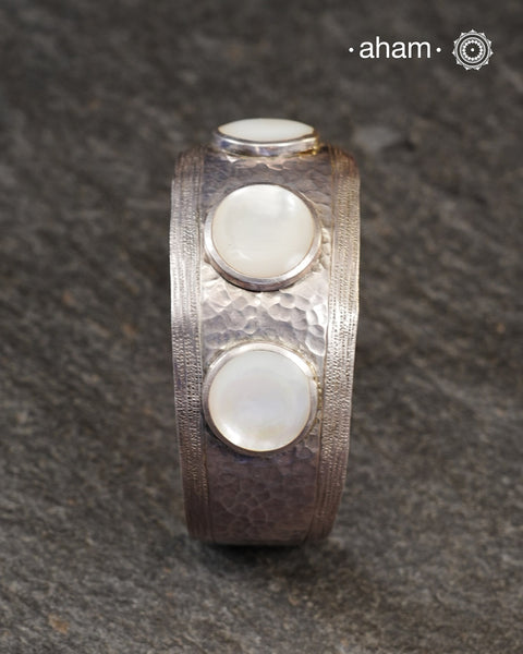 One of a kind statement wearable art pieces.
92.5 silver hand kada with mother of pearl

The price is for one piece kada only.