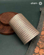 Statement Adjustable 92.5 sterling silver handcuff with intricate weave pattern.
Sometimes all you need is one piece of accessory to make you feel powerful, and this is just that. 