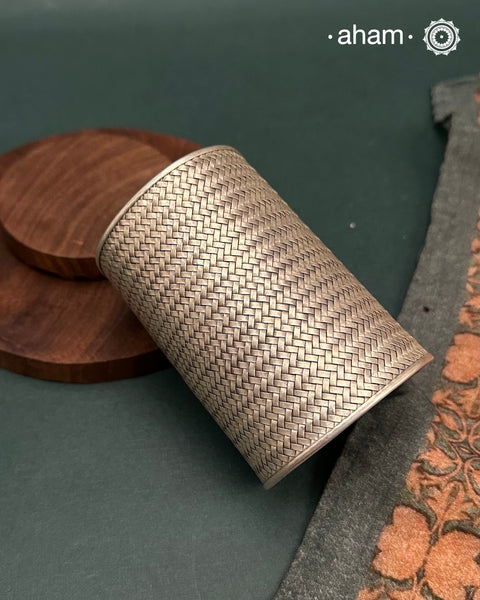 Statement Adjustable 92.5 sterling silver handcuff with intricate weave pattern.
Sometimes all you need is one piece of accessory to make you feel powerful, and this is just that. 