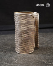 Statement  Adjustable 92.5 sterling silver handcuff with intricate weave pattern. Sometimes all you need is one piece of accessory to make you feel powerful, and this is just that.