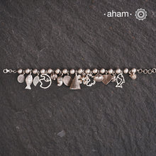 Up your wrist game with the A.M P.M Silver bracelet!
15 beautiful distinct charms all crafted in 92.5 silver come together to make this piece . Whether worn at day or night, this bracelet is Perfect for adding a playful touch to any outfit.

The price is for one piece only.