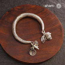 Up your wrist game with the A.M P.M Silver bracelet!The charm bracelet, complete with a beautiful weave pattern inspired by Thai craftsmanship. Perfect for adding a playful touch to any outfit.

The price is for one piece only.