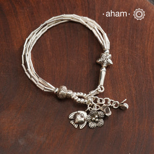 Up your wrist game with the A.M P.M Silver bracelet! Beautiful distinct charms all crafted in 92.5 silver come together to make this piece. Whether worn at day or night, this bracelet is perfect for adding a playful touch to any outfit.
The price is for one piece only.
