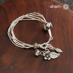 Up your wrist game with the A.M P.M Silver bracelet! Beautiful distinct charms all crafted in 92.5 silver come together to make this piece. Whether worn at day or night, this bracelet is perfect for adding a playful touch to any outfit.
The price is for one piece only.