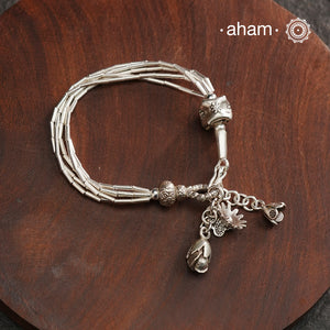 Up your wrist game with the A.M P.M Silver bracelet! Beautiful distinct charms all crafted in 92.5 silver come together to make this piece. Whether worn at day or night, this bracelet is perfect for adding a playful touch to any outfit.
The price is for one piece only.