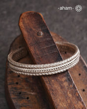 Statement Adjustable 92.5 sterling silver handcuff with intricate weave pattern.Sometimes all you need is one piece of accessory to make you feel powerful, and this is just that. The price is for one piece only.