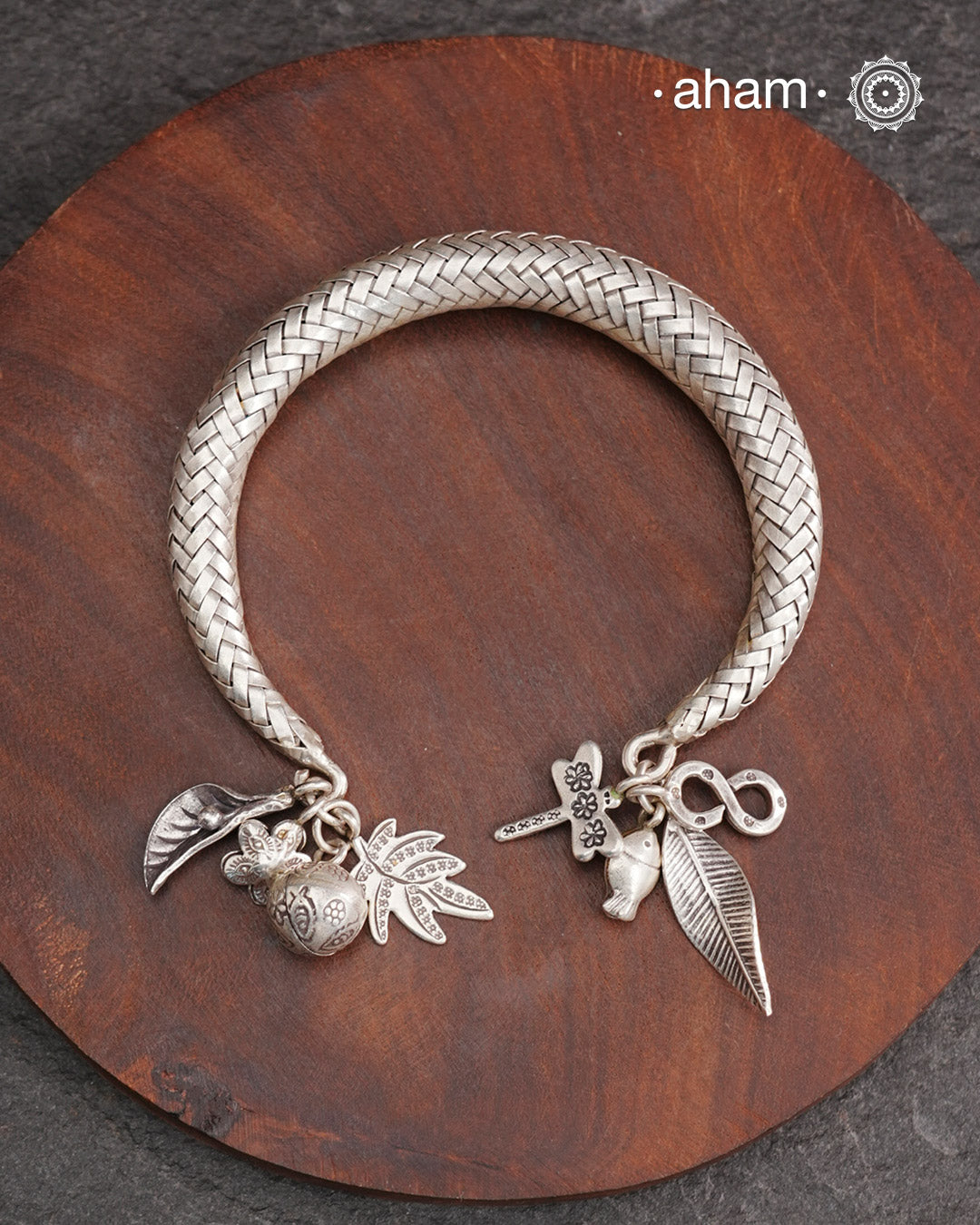 Up your wrist game with the A.M P.M Silver bracelet! The charm bracelet, complete with a beautiful weave pattern inspired by Thai craftsmanship. Perfect for adding a playful touch to any outfit. These are crafted in the finest 92.5 silver
The price is for one piece only.