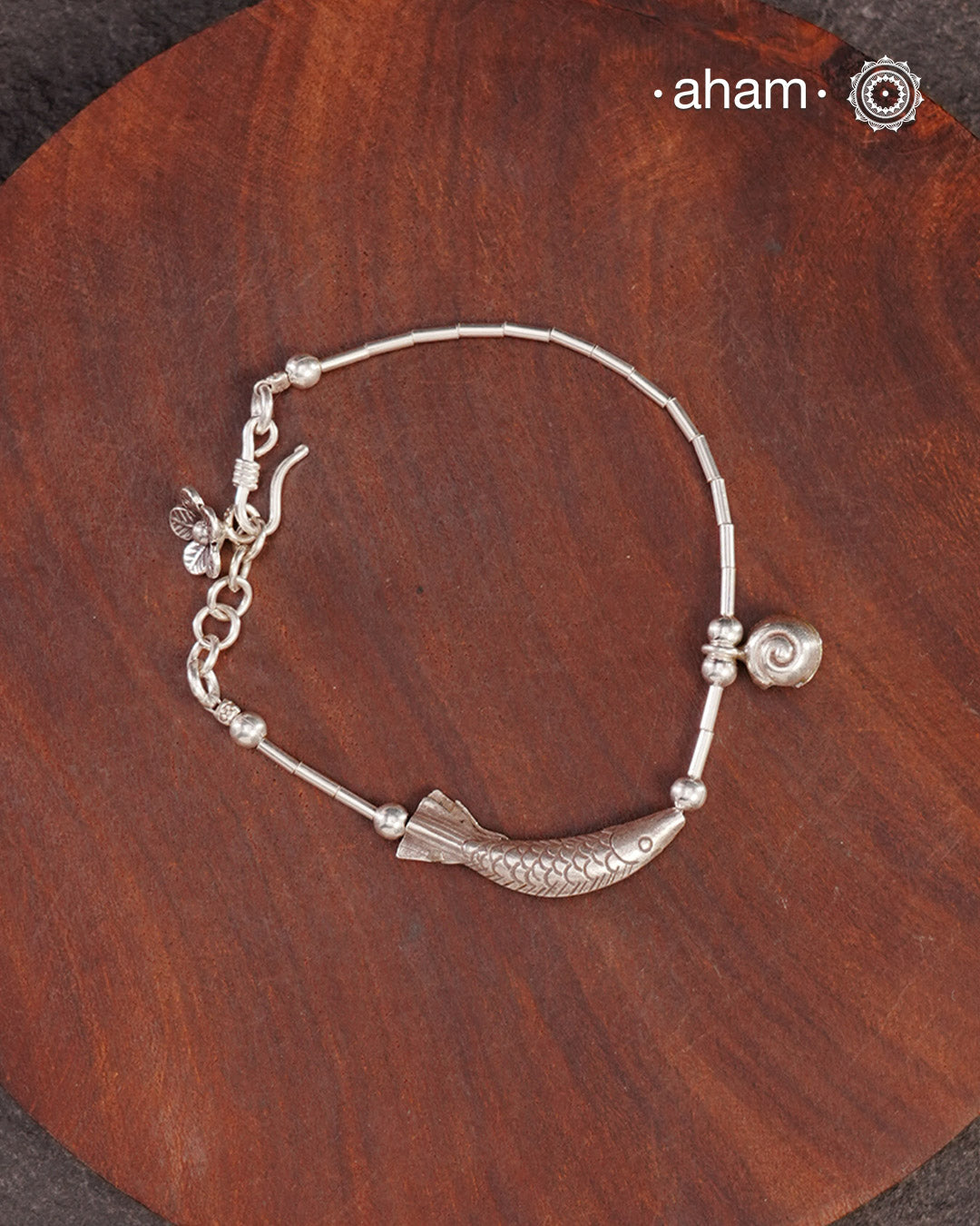 Up your wrist game with the A.M P.M Silver bracelet!
beautiful distinct charms all crafted in 92.5 silver come together to make this piece .

Whether worn at day or night, this bracelet is Perfect for adding a playful touch to any outfit.

The price is for one piece only.