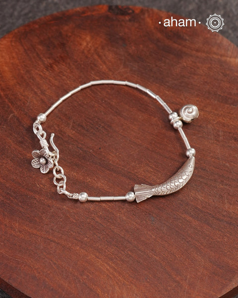 Up your wrist game with the A.M P.M Silver bracelet!
beautiful distinct charms all crafted in 92.5 silver come together to make this piece .

Whether worn at day or night, this bracelet is Perfect for adding a playful touch to any outfit.

The price is for one piece only.