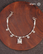 Up your wrist game with the A.M P.M Silver bracelet!
beautiful distinct charms all crafted in 92.5 silver come together to make this piece .

Whether worn at day or night, this bracelet is Perfect for adding a playful touch to any outfit.

The price is for one piece only.