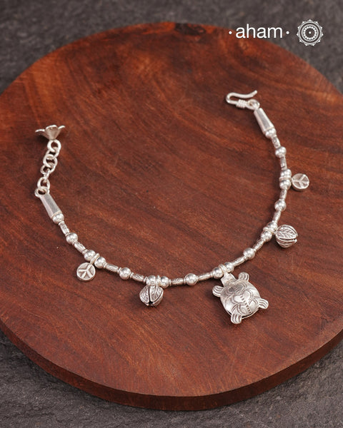 Up your wrist game with the A.M P.M Silver bracelet!
beautiful distinct charms all crafted in 92.5 silver come together to make this piece .

Whether worn at day or night, this bracelet is Perfect for adding a playful touch to any outfit.

The price is for one piece only.