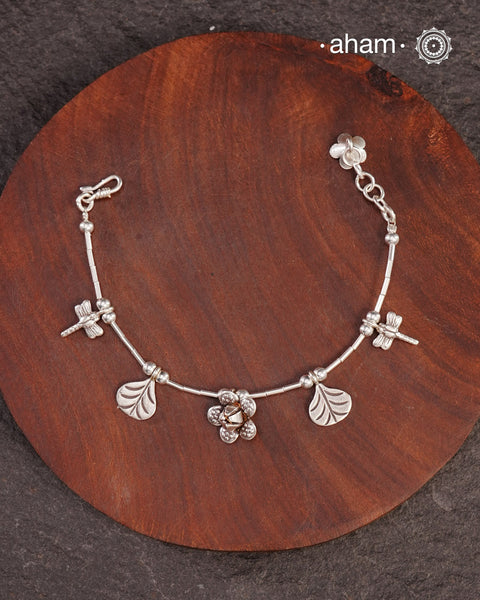 Up your wrist game with the A.M P.M Silver bracelet!
beautiful distinct charms all crafted in 92.5 silver come together to make this piece .

Whether worn at day or night, this bracelet is Perfect for adding a playful touch to any outfit.

The price is for one piece only.