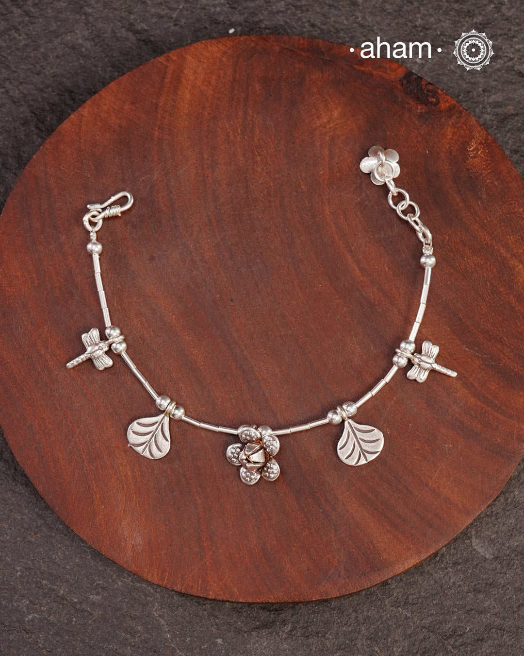 Up your wrist game with the A.M P.M Silver bracelet!
beautiful distinct charms all crafted in 92.5 silver come together to make this piece .

Whether worn at day or night, this bracelet is Perfect for adding a playful touch to any outfit.

The price is for one piece only.