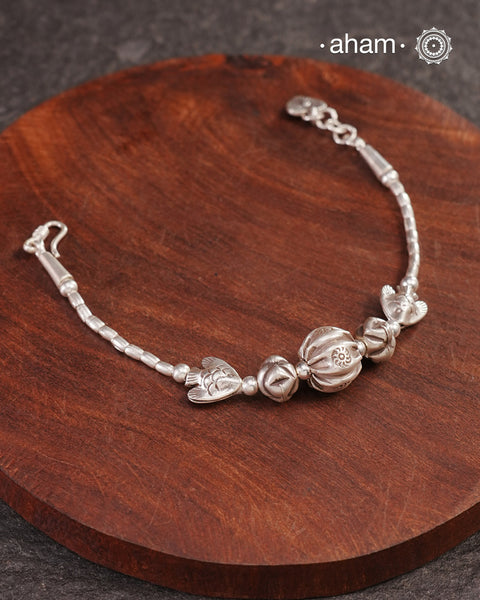 Up your wrist game with the A.M P.M Silver bracelet!
beautiful distinct charms all crafted in 92.5 silver come together to make this piece .

Whether worn at day or night, this bracelet is Perfect for adding a playful touch to any outfit.

The price is for one piece only.