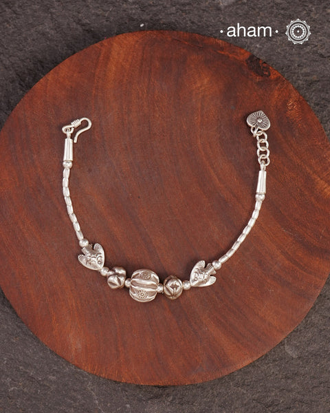 Up your wrist game with the A.M P.M Silver bracelet!
beautiful distinct charms all crafted in 92.5 silver come together to make this piece .

Whether worn at day or night, this bracelet is Perfect for adding a playful touch to any outfit.

The price is for one piece only.