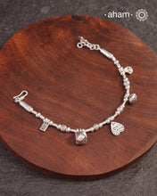 Up your wrist game with the A.M P.M Silver bracelet!
beautiful distinct charms all crafted in 92.5 silver come together to make this piece .

Whether worn at day or night, this bracelet is Perfect for adding a playful touch to any outfit.

The price is for one piece only.
