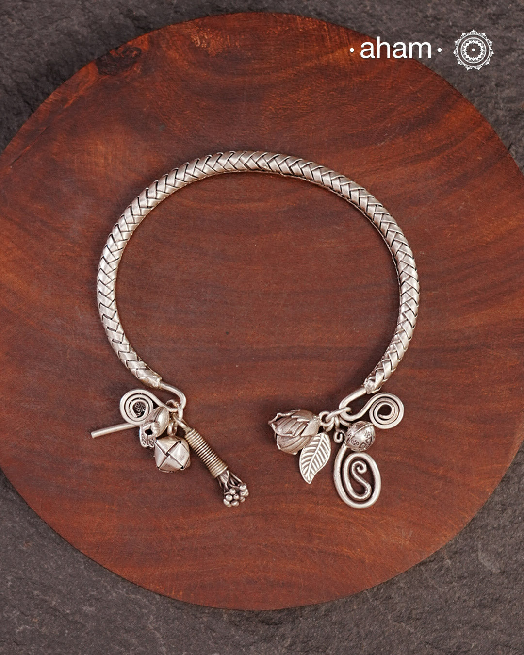 Up your wrist game with the A.M P.M Silver bracelet! The charm bracelet, complete with a beautiful weave pattern inspired by Thai craftsmanship. Perfect for adding a playful touch to any outfit. These are crafted in the finest 92.5 silver

The price is for one piece only.