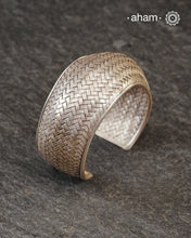 Statement Adjustable 92.5 sterling silver handcuff with intricate weave/ Chatai pattern.
Sometimes all you need is one piece of accessory to make you feel powerful, and this is just that.