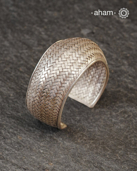 Statement Adjustable 92.5 sterling silver handcuff with intricate weave/ Chatai pattern.
Sometimes all you need is one piece of accessory to make you feel powerful, and this is just that.