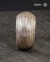Statement Adjustable 92.5 sterling silver handcuff with intricate weave/ Chatai pattern.
Sometimes all you need is one piece of accessory to make you feel powerful, and this is just that. 