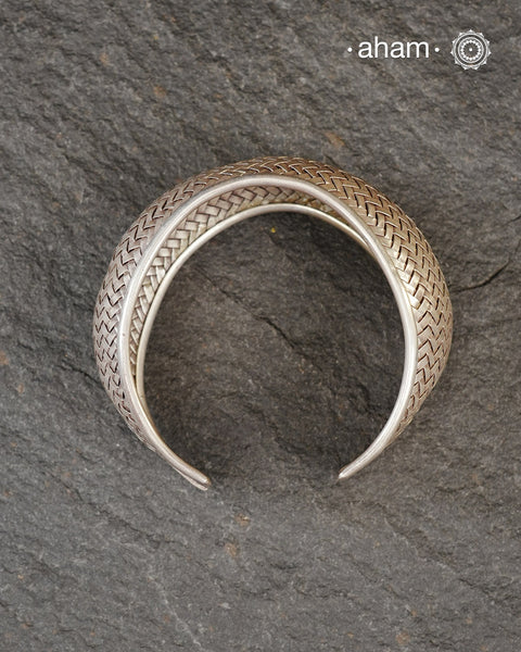 Statement Adjustable 92.5 sterling silver handcuff with intricate weave/ Chatai pattern.
Sometimes all you need is one piece of accessory to make you feel powerful, and this is just that. 