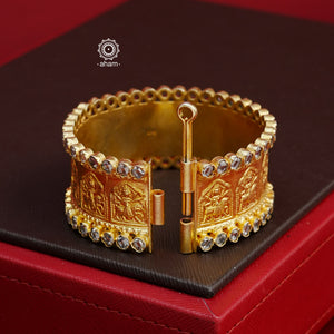 This gold polish silver Kada with zircon stone highlights is a classic and versatile piece, crafted in silver for weddings and special occasions. Its elegant design and openable option make it a must-have accessory. Add a touch of sophistication to any outfit with this timeless Kada. The price is for a One pieces kada only. 