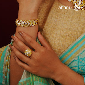 Embrace the allure of timeless elegance with Aham Jewellery’s latest Mother of Pearl collection, a radiant choice for festive celebrations and weddings.

The bracelet is crafted in 92.5 silver and adorned with a luxurious gold polish, capturing the iridescent beauty of mother of pearl. 
